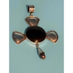 Handcrafted Peruvian Silver with Black Onyx center Pendant by ‎ Ximena Damian